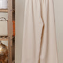 Tan and ivory Striped wide leg women’s pants with lace detail hem