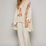 POL- V-neck floral print multi color peace patch top