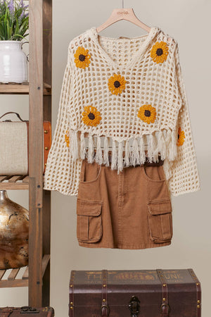Boho style crochet sunflower sweater with fringe detail 