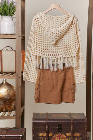 Back of boho sweater with sunflowers and fringe details 